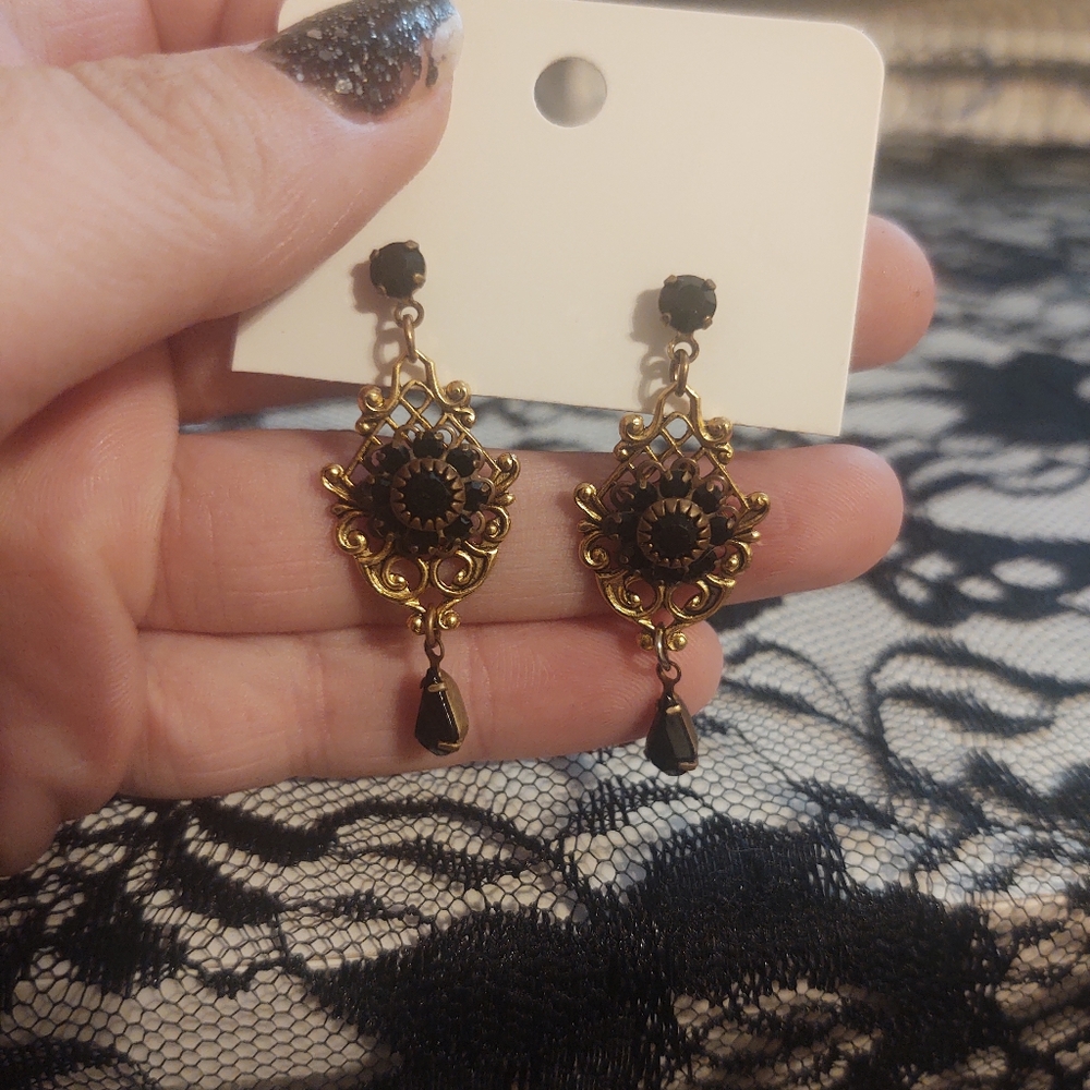 Gold and black earrings